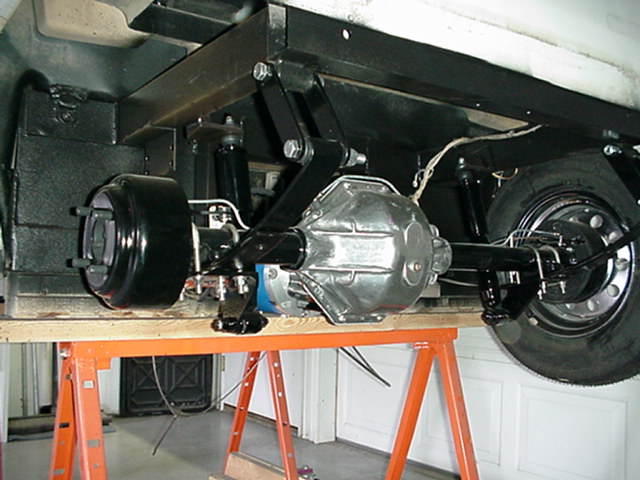 Angled view of the restored rear axle assembly with polished center section
